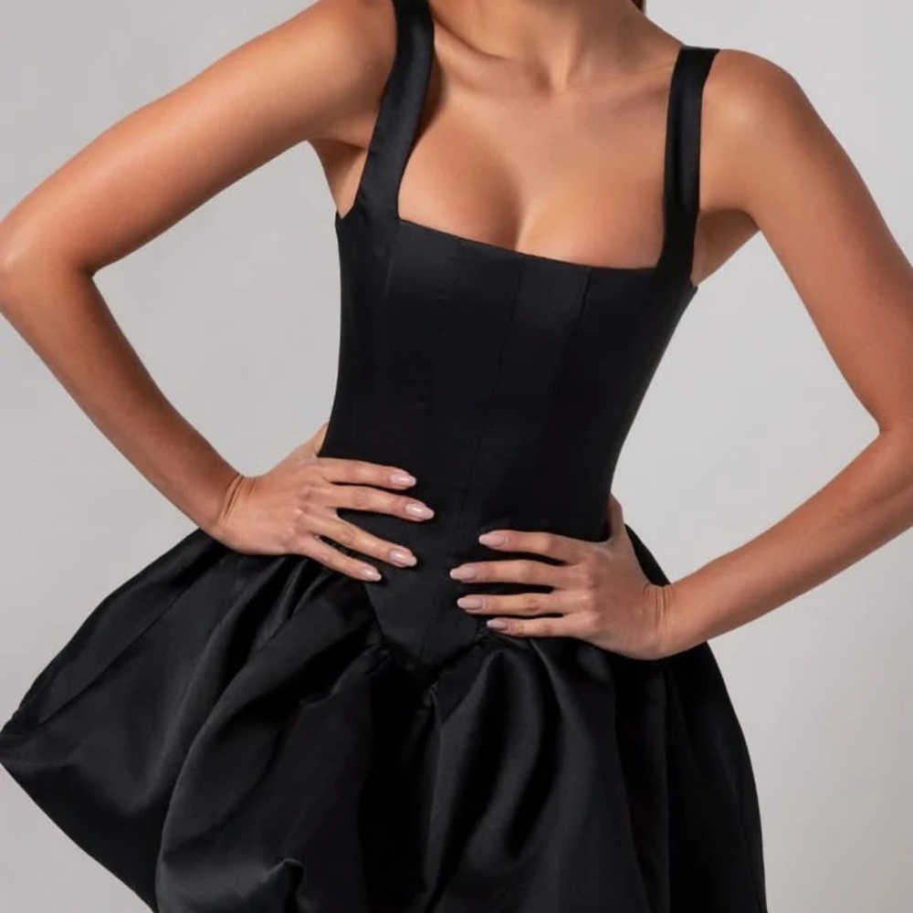 Size S Heiress Beverly Hills poof dress. Never worn, it was too small.